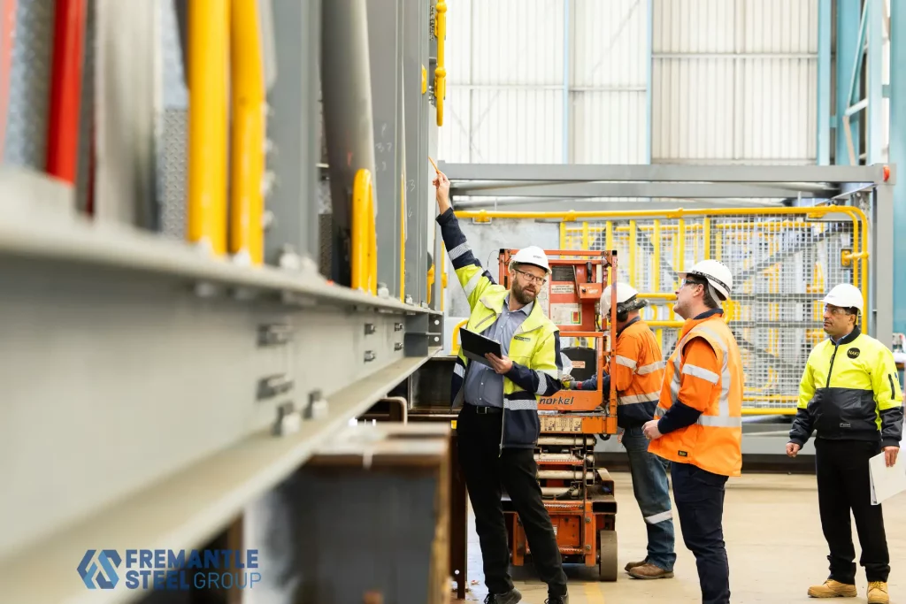person assessing steel